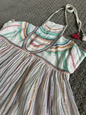 Anthro festive multicolored halter top with high neck and tassel tie-back. Sz 8